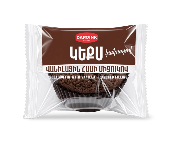 Cupcake with cocoa and vanilla filling